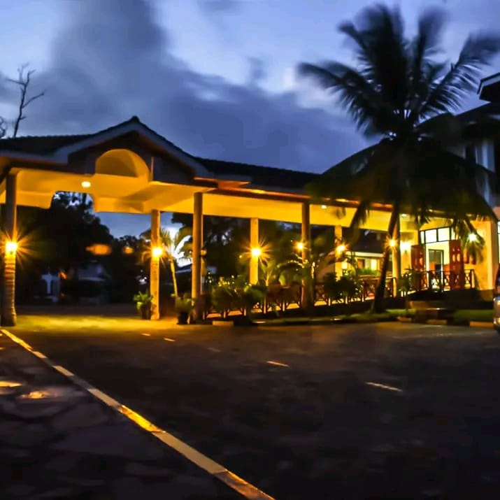 Resort driveway and entrance at dusk